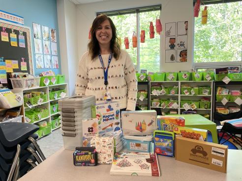 Teacher with STEM bins