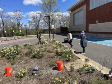 Photo of volunteers planting the pollinator garden