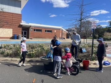 Photo of volunteers planting the pollinator garden