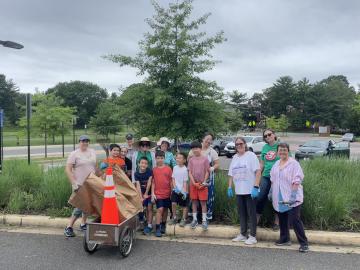 Photo of volunteers who weeded the pollinator garden