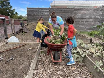Volunteers clearing garden beds in the Abingdon Garden