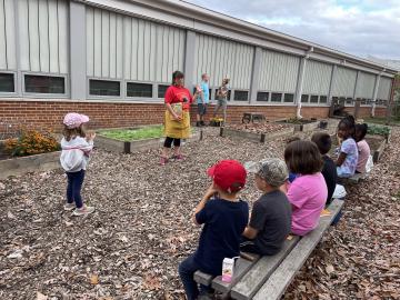 Volunteers learning about Native American culture