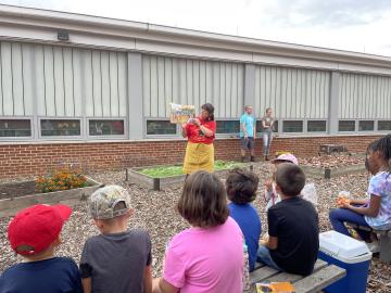 Volunteers learning about Native American culture