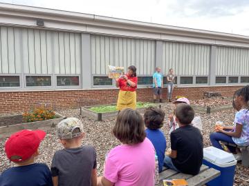 Volunteers learning about Native American culture